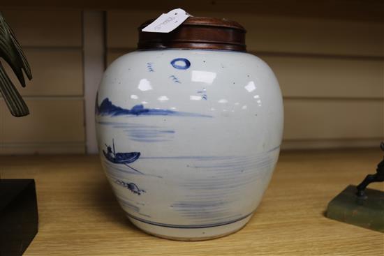 A Chinese blue and white ovoid jar, 18th century, total height 23.5cm including pierced wood cover